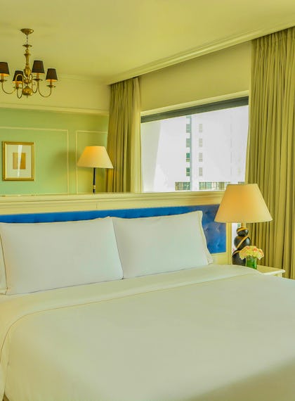 Luxury corner suite with city vistas at The Kingsbury Hotel