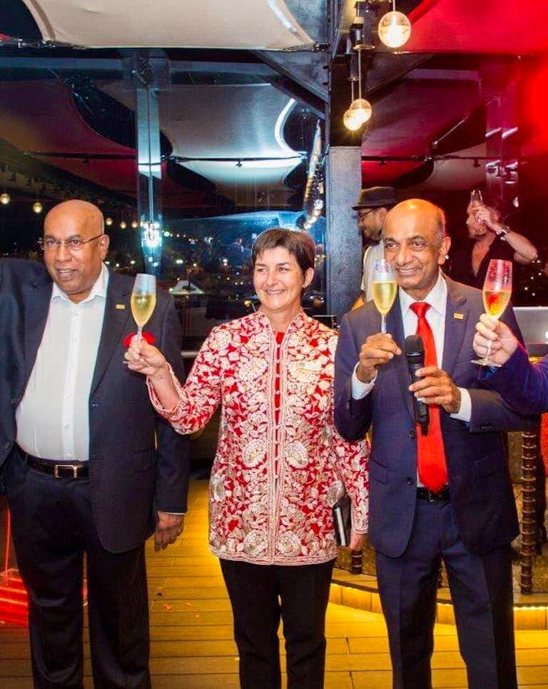 The executive team of Kingsbury and CELAVI toasting at an event